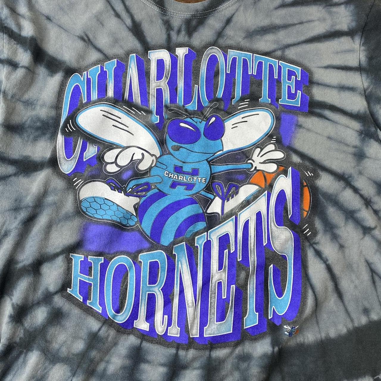 Charlotte Hornets vintage t shirt Size: - Depop