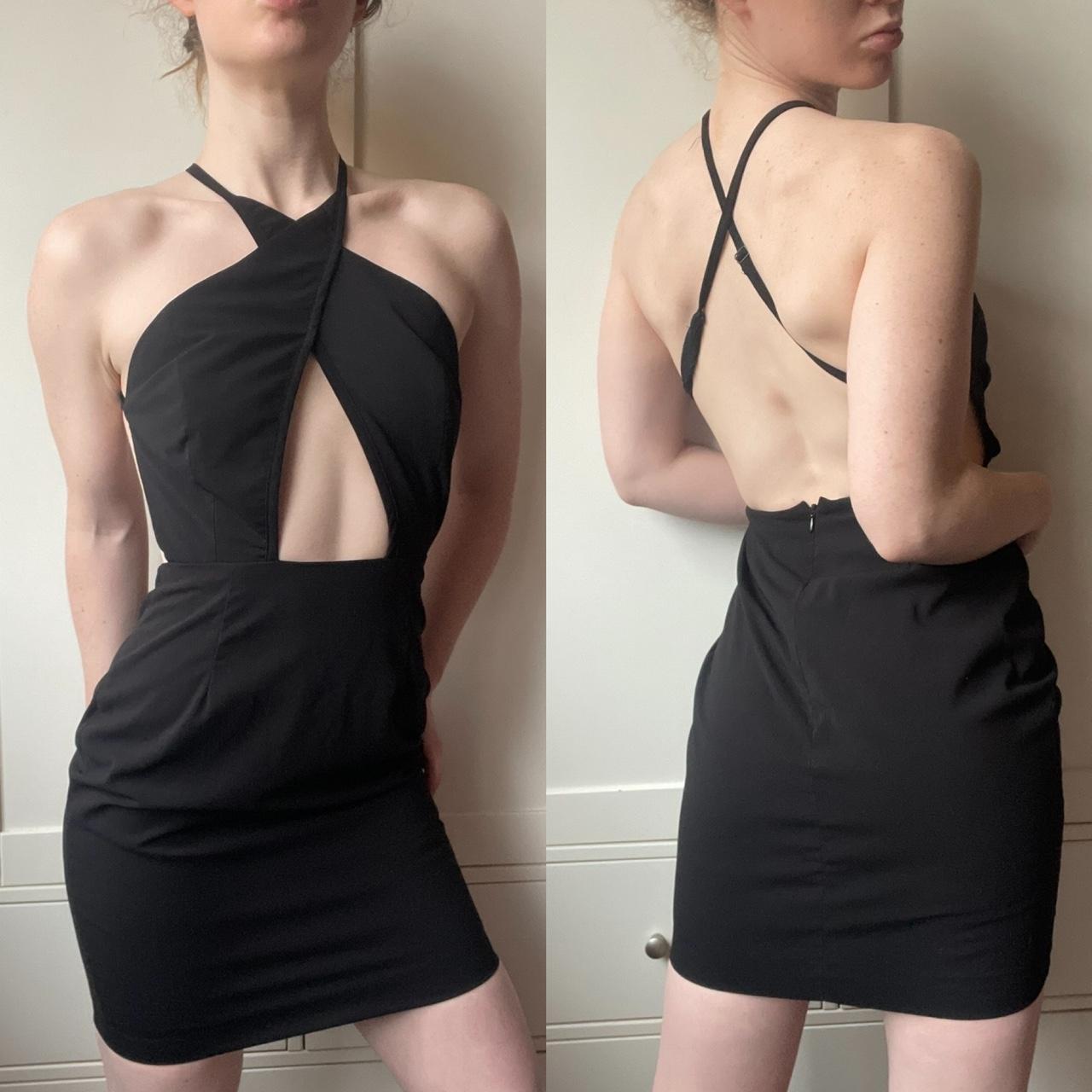 Stunning black halter mini dress with wrap cut out... - Depop