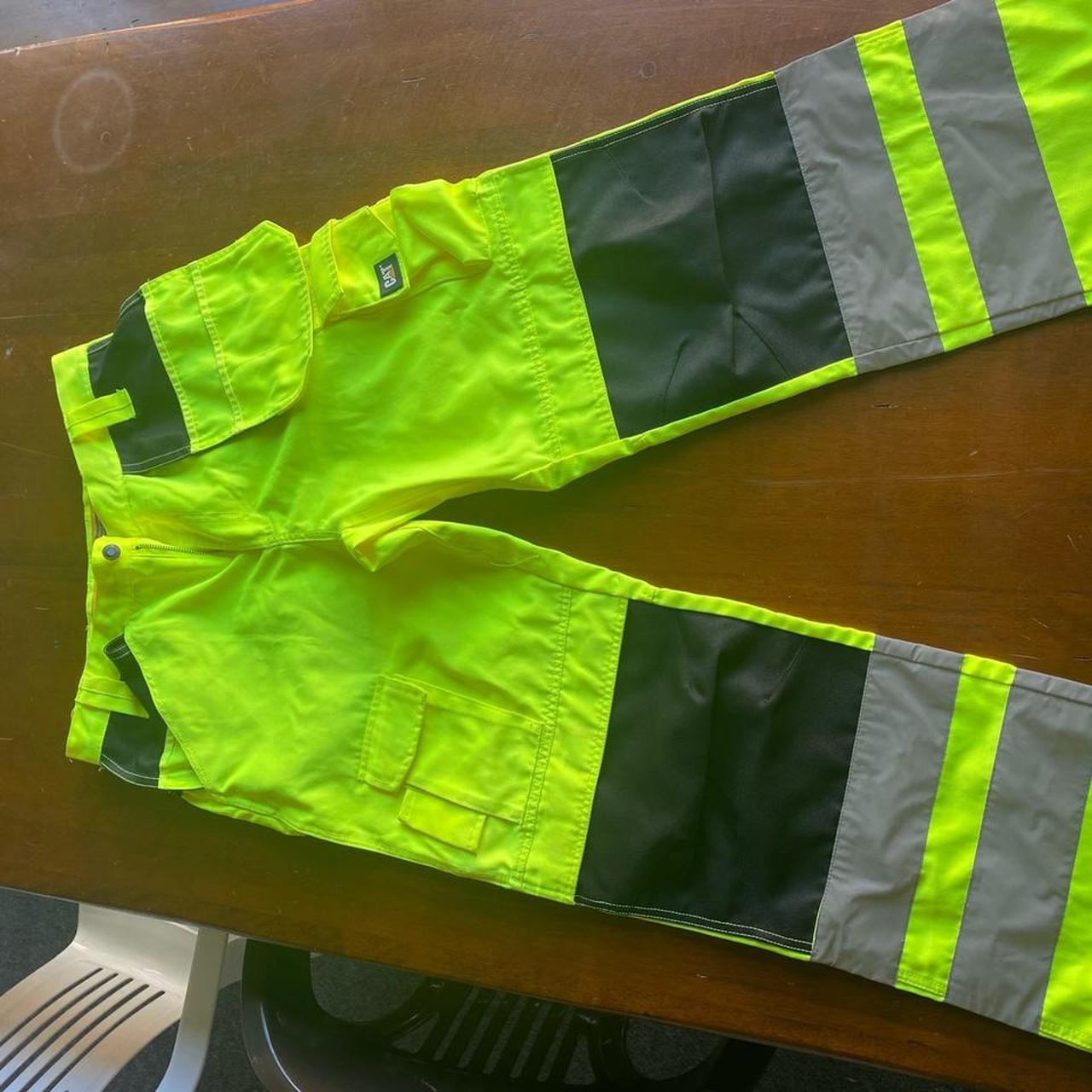 cat construction high visibility pants, very good... Depop