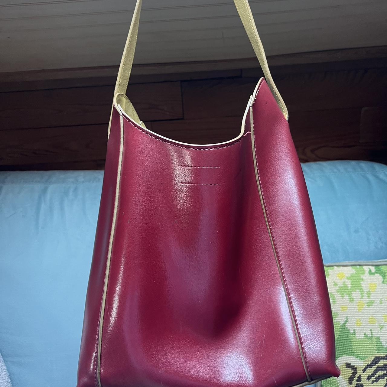 red leather shoulder bag has some damage on the... - Depop