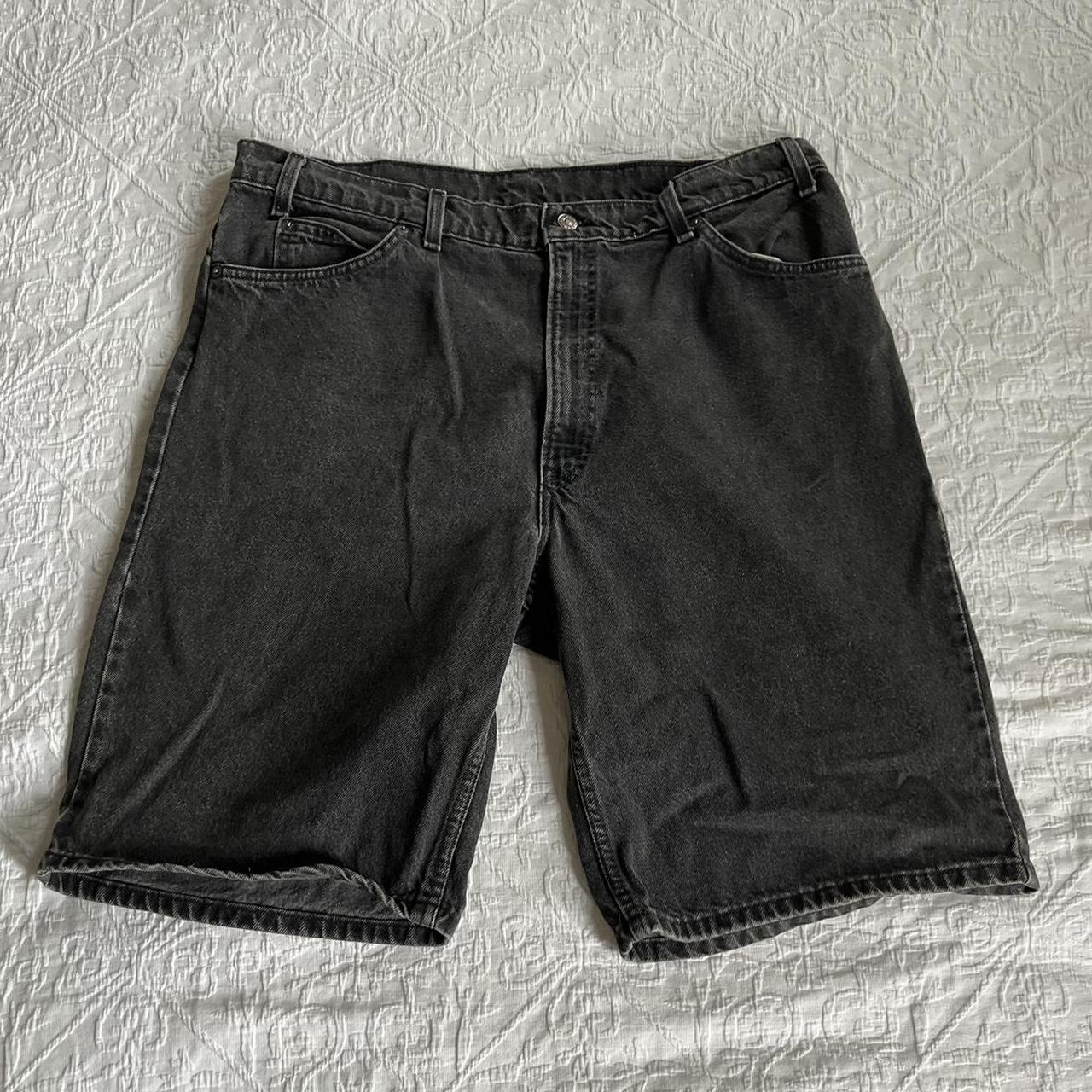 Vintage Levi’s 550 faded/washed black jorts. Stiff,... - Depop