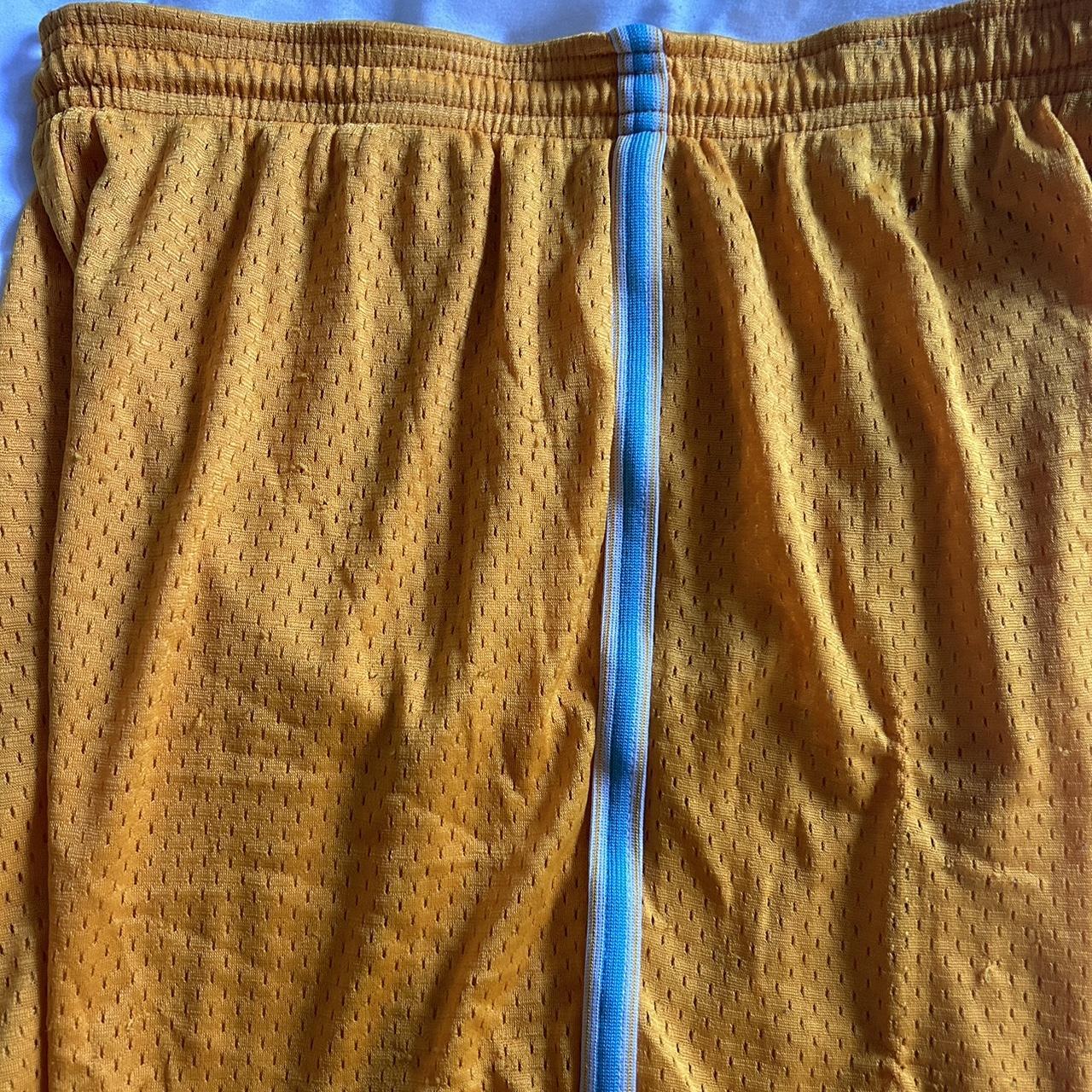 Reebok shorts womens sale gold