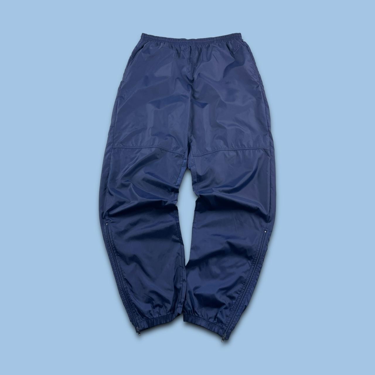 nike shell tracksuit bottoms