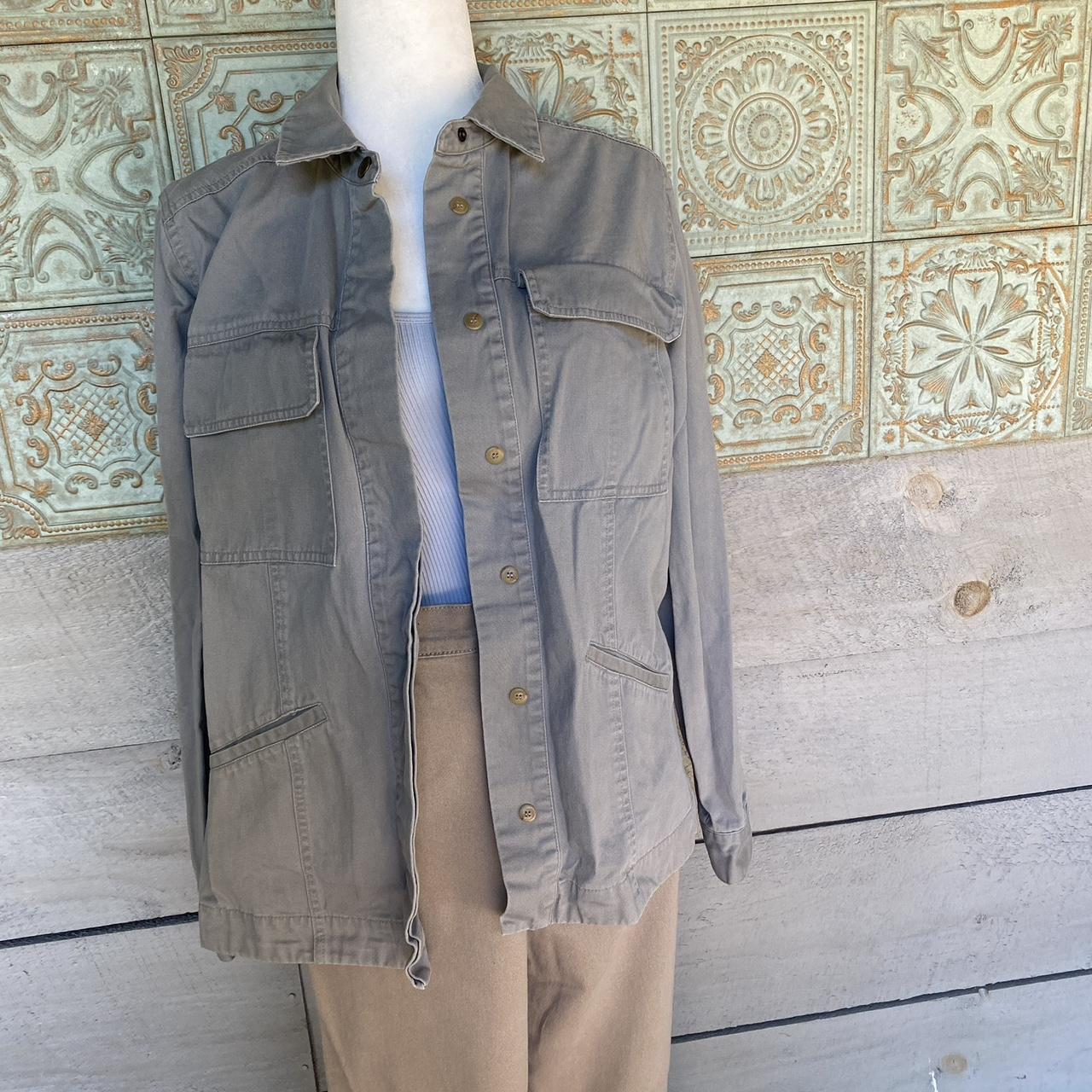 Size medium grey utility jacket with lots of... Depop