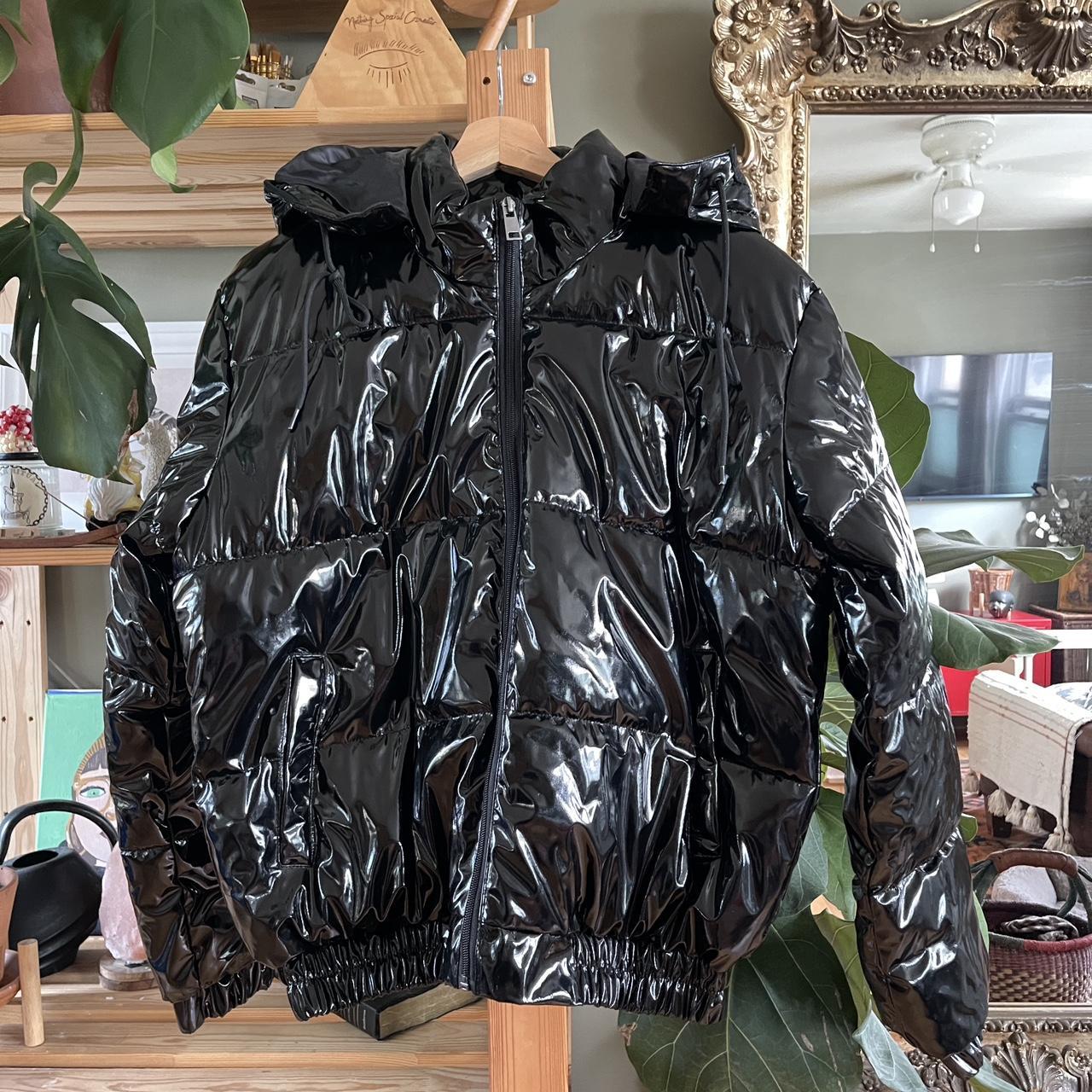 Black puffer jacket with zipper and detachable