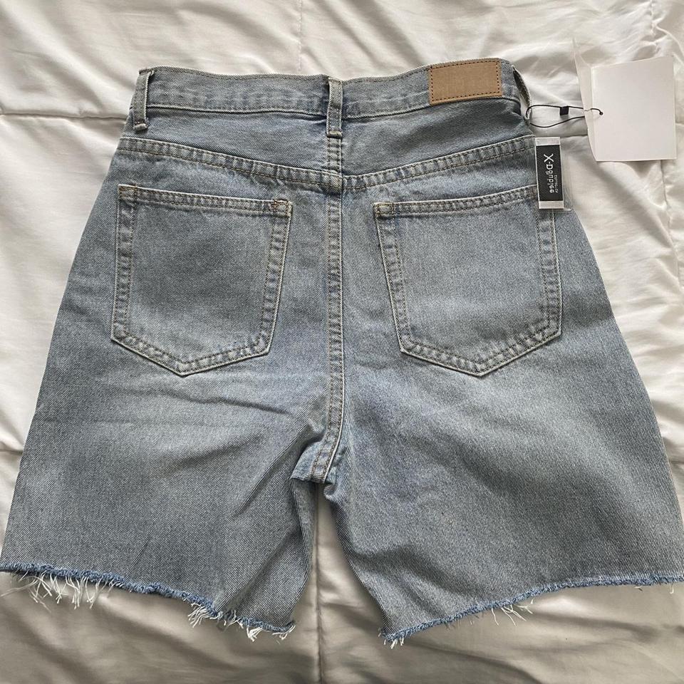 light wash jean shorts with frayed hem originally... - Depop