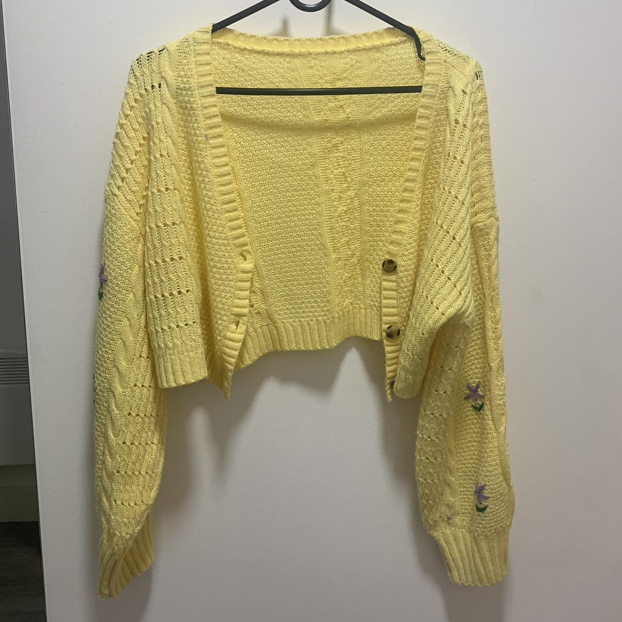 Yellow knitted cardigan with purple flower detailing... - Depop