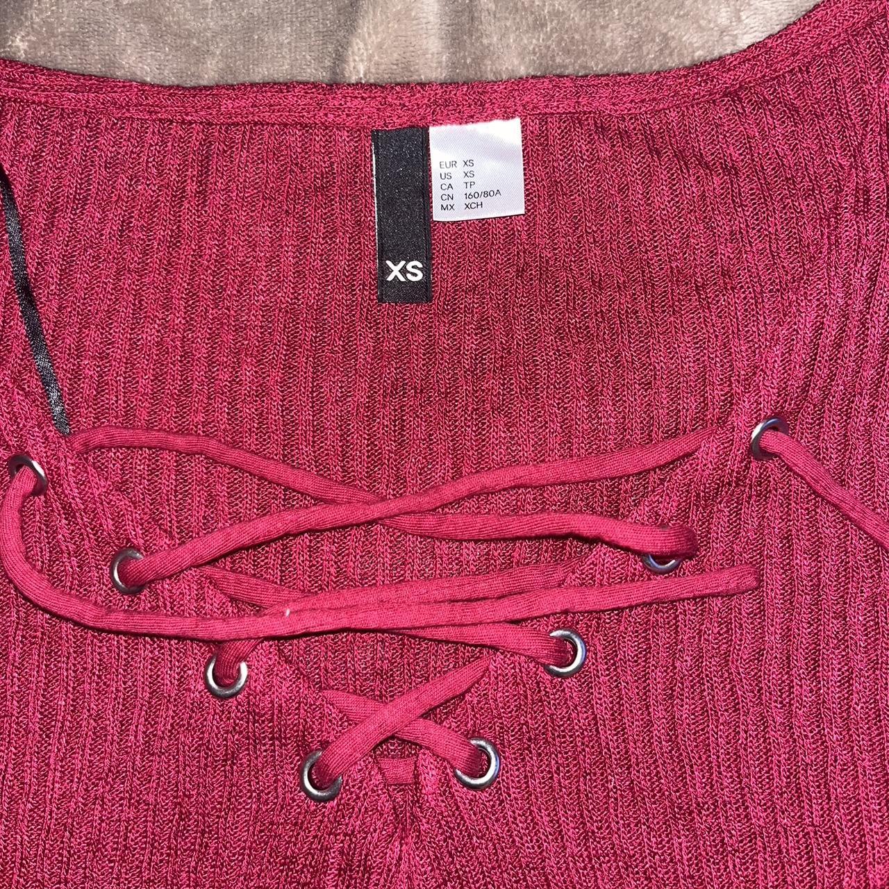 Red lace up long sleeve top from H&M. Never worn so... Depop