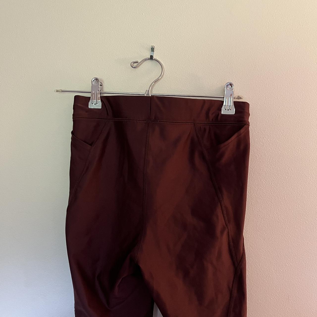 Shiny maroon nike leggings size small - Depop