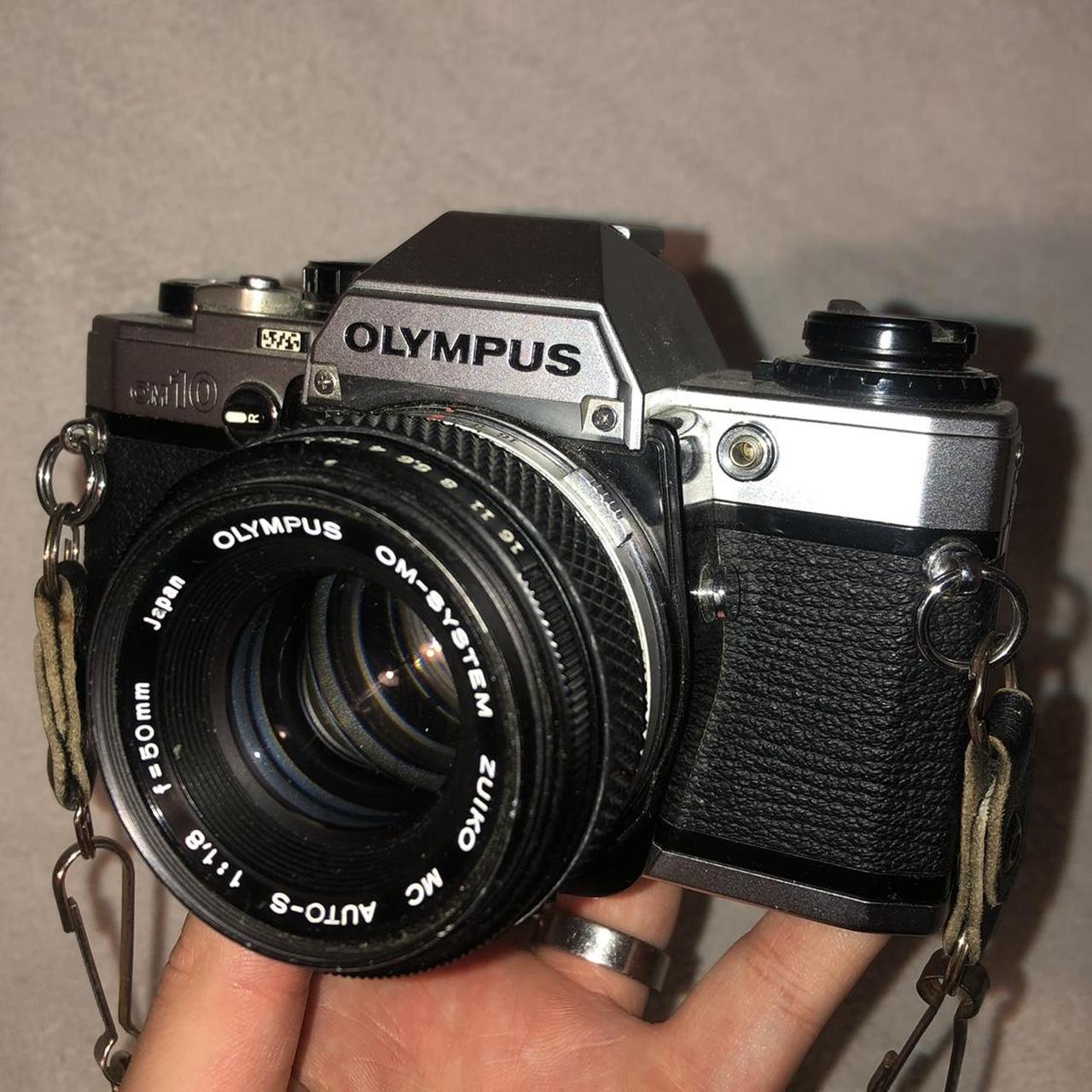 Fully working Olympus OM 10 35mm film camera, with... Depop