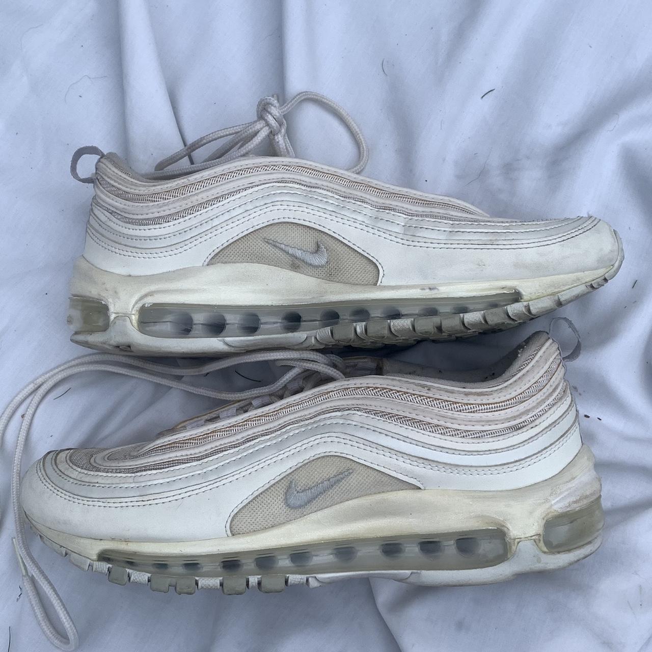 Nike Air Max 97s in white and grey