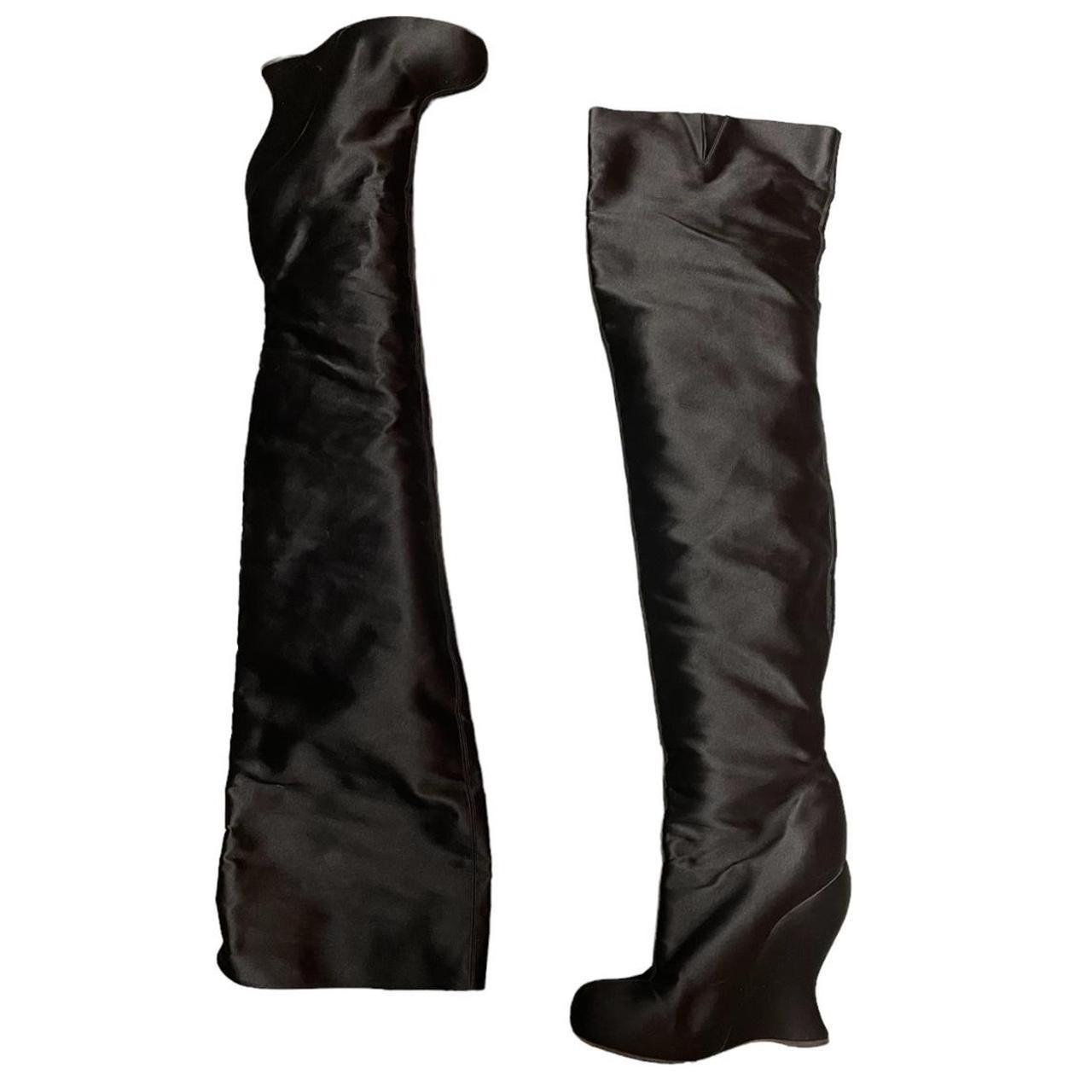 Black thigh best sale high wedge boots