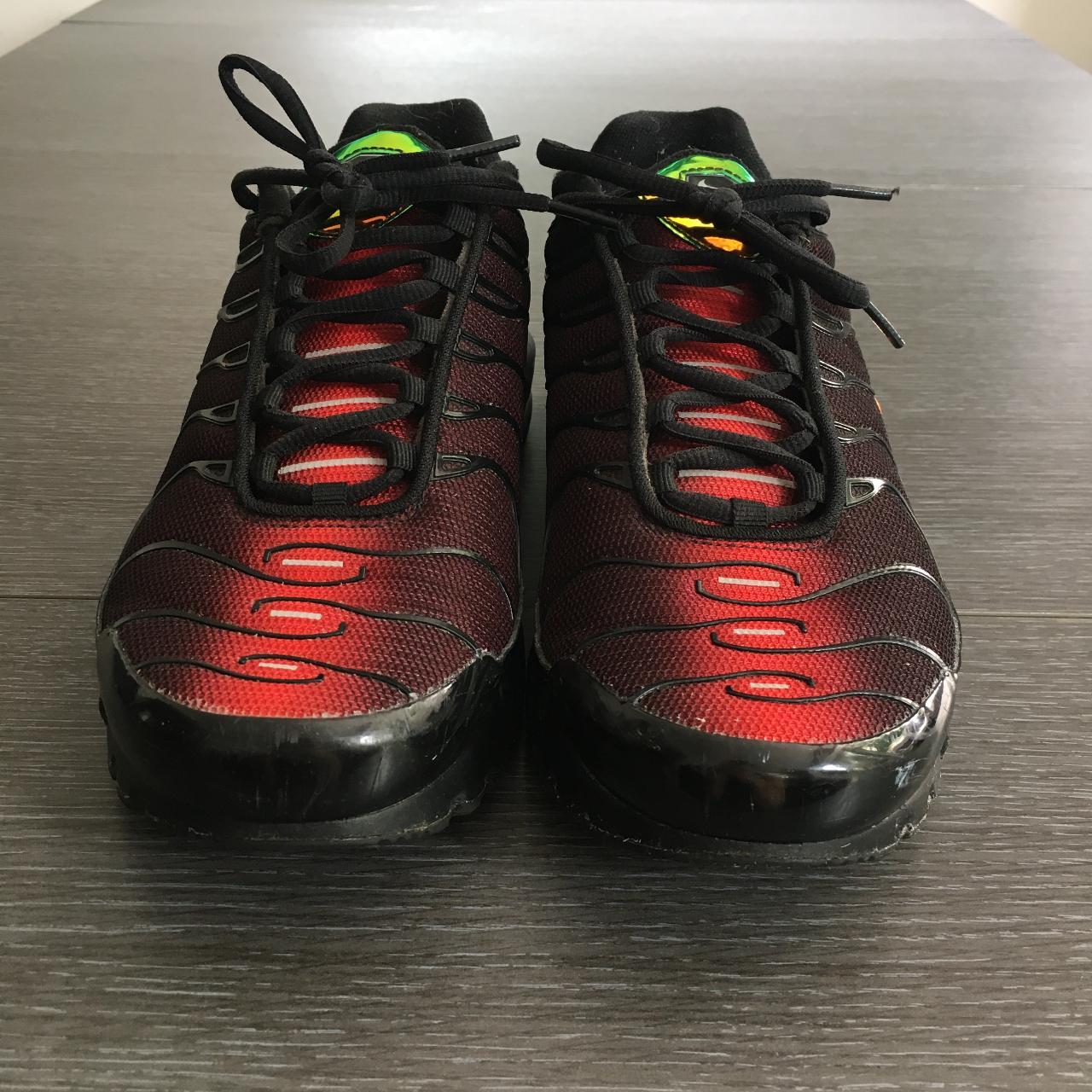 green and black nike tn