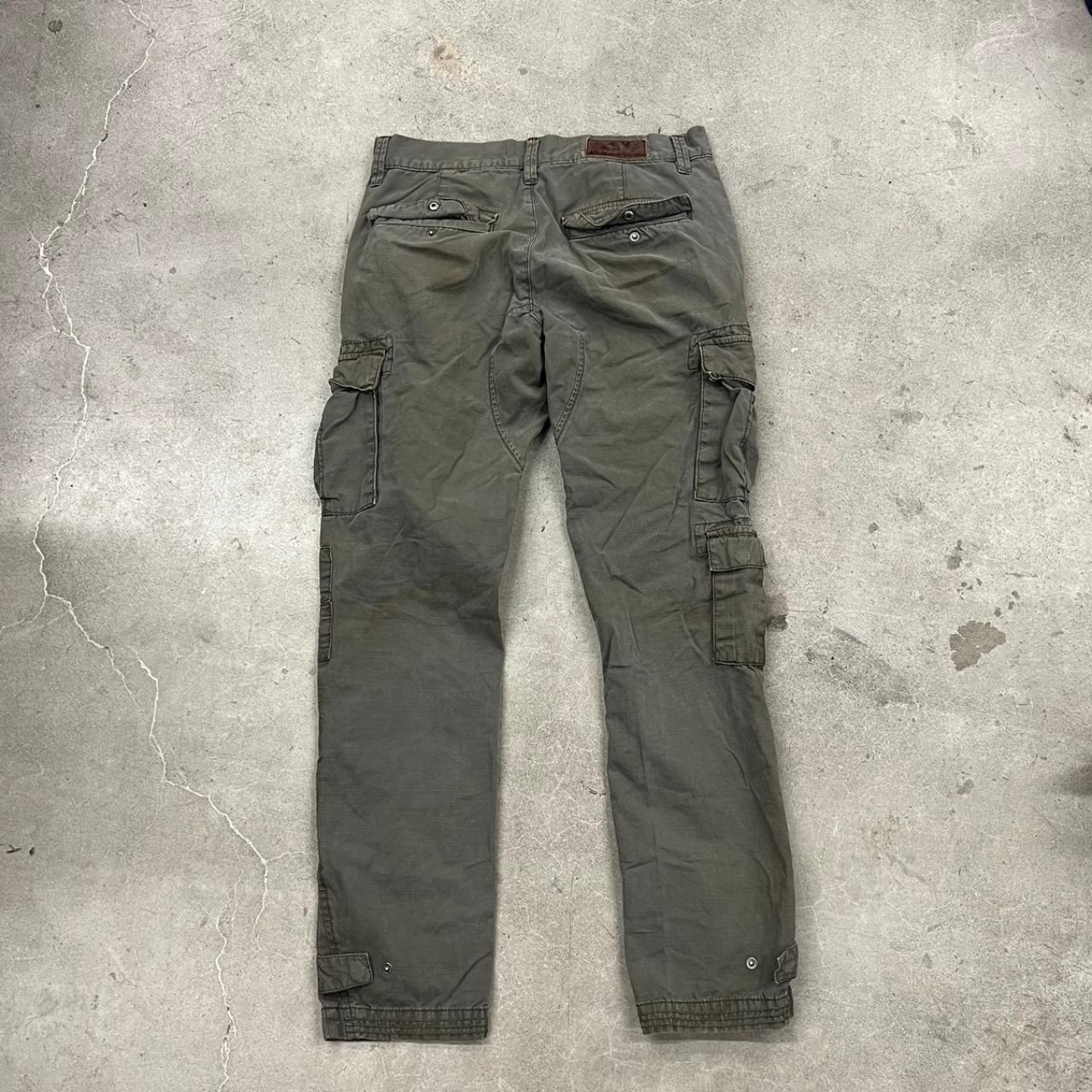 Vintage cargo pants on Depop by @sisifrommars