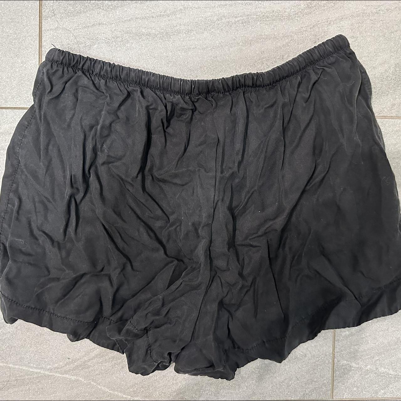 Brandy Melville flowy black shorts. The tag is - Depop