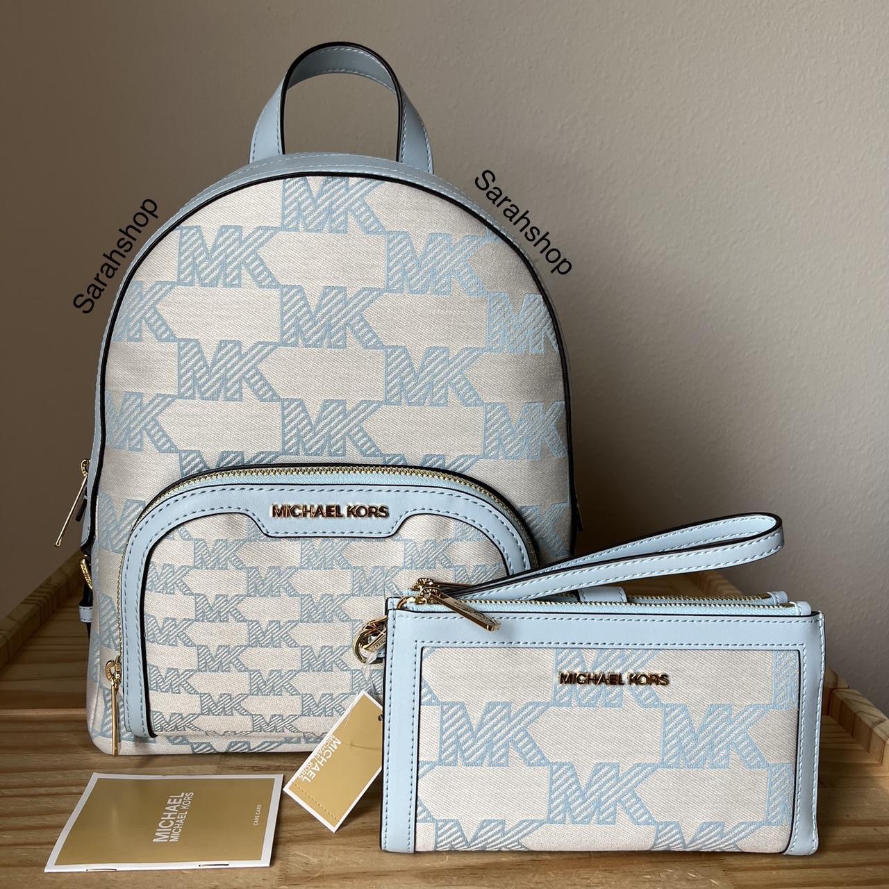 Michael kors best sale cream backpack