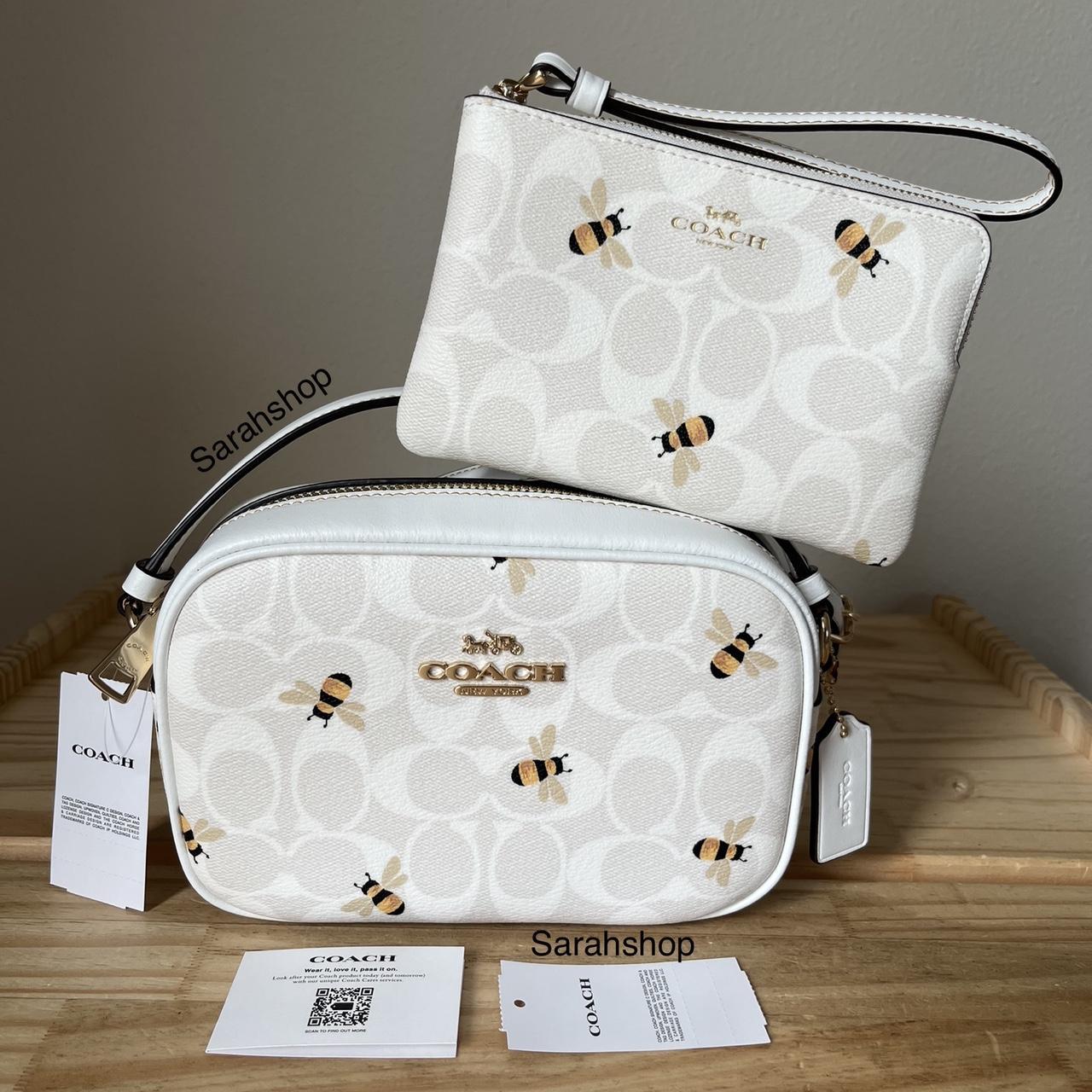 This coach bee mini purse is no longer sold in - Depop