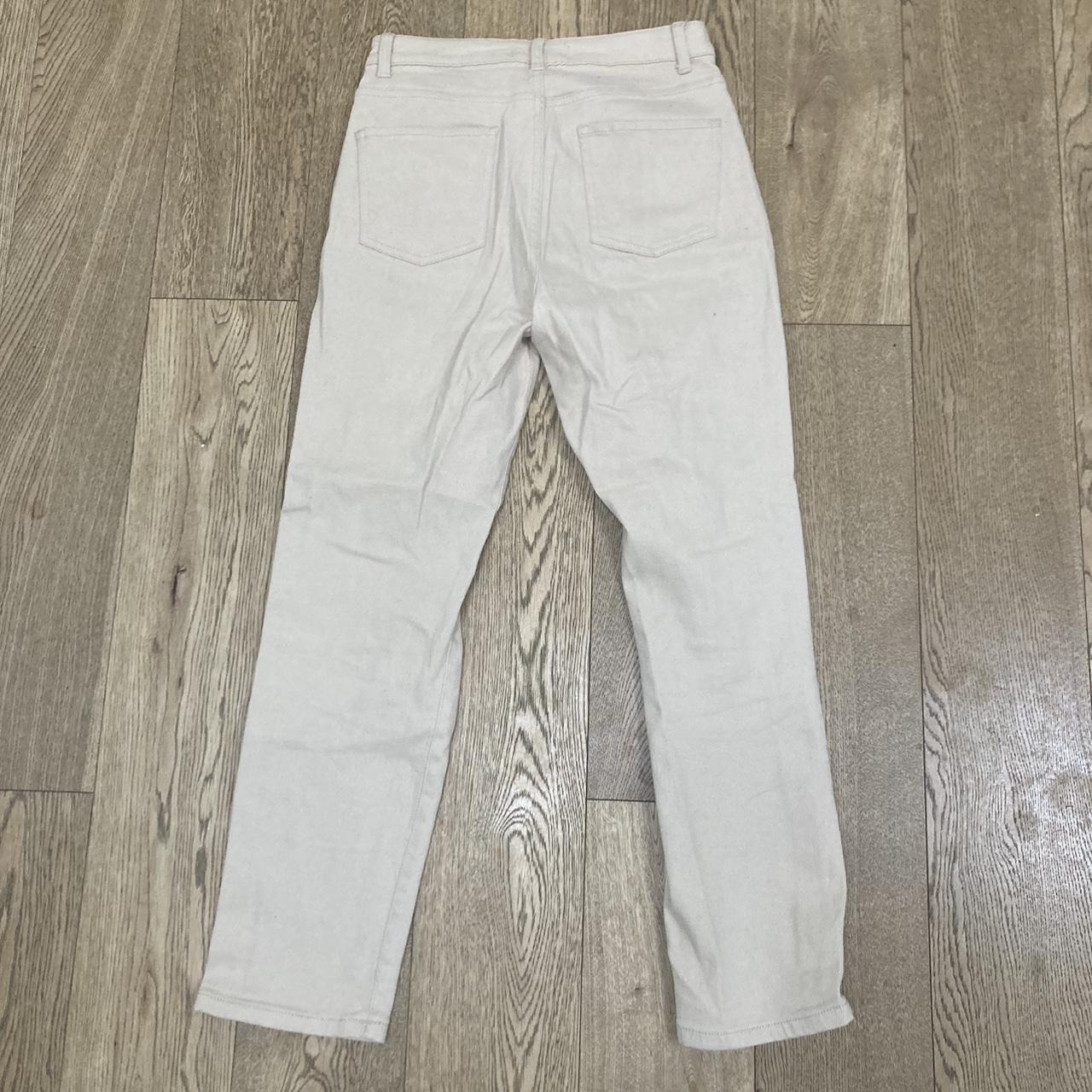 Beige primark high waisted mom jeans Small stain... Depop