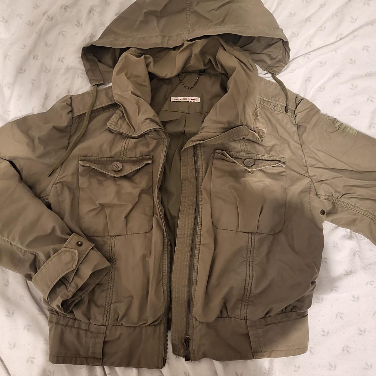 Khaki Levis puffer zip up jacket with hood that can... - Depop