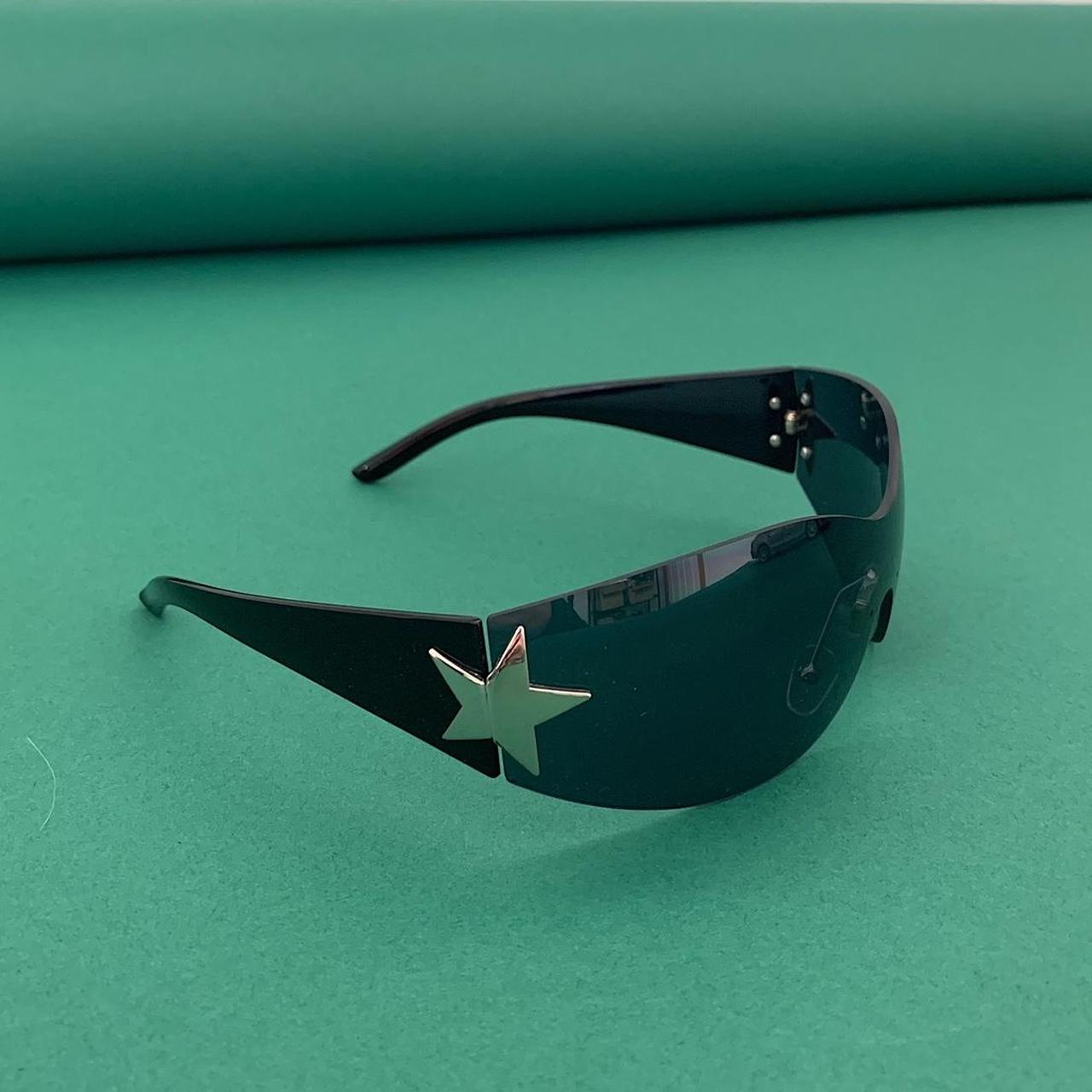 Y2k 2000s vintage style frameless silver star... Depop