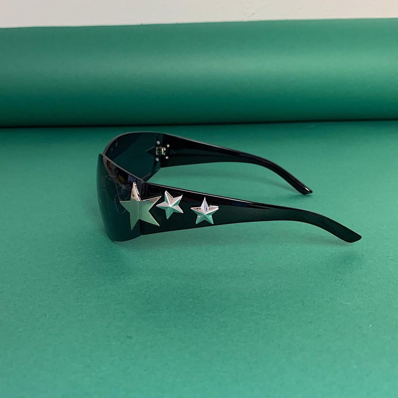 Y2k 2000s vintage style frameless silver star... - Depop