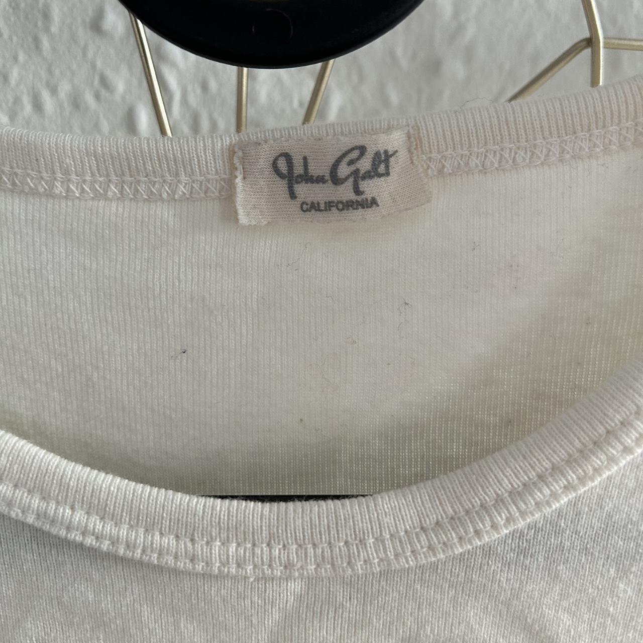 Brandy Melville White baby tee Worn few times,... - Depop