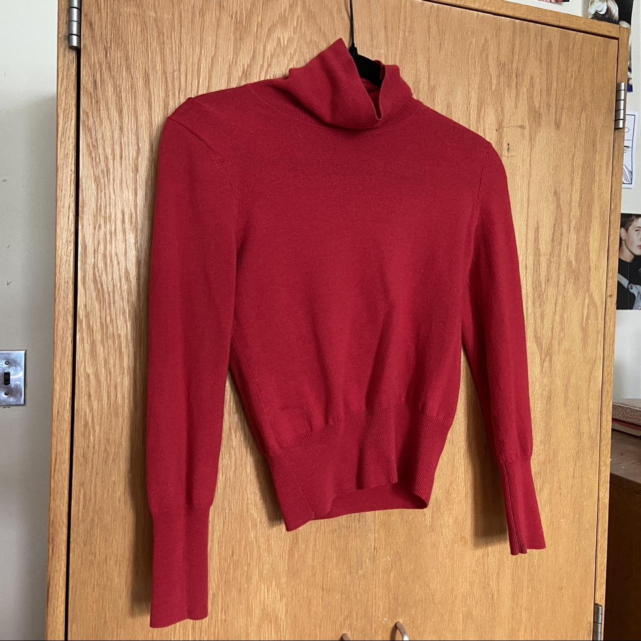 bright red turtleneck sweater