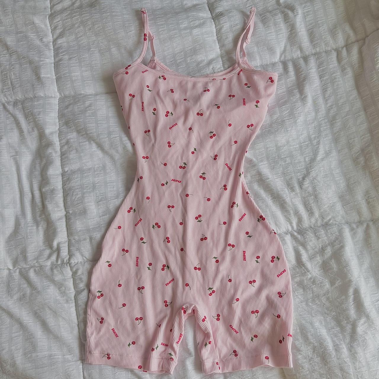 Preloved Pink Cheetah Print Onesie! size m. has - Depop