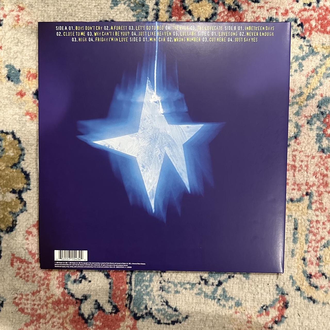 The cure greatest hits album on a black... Depop