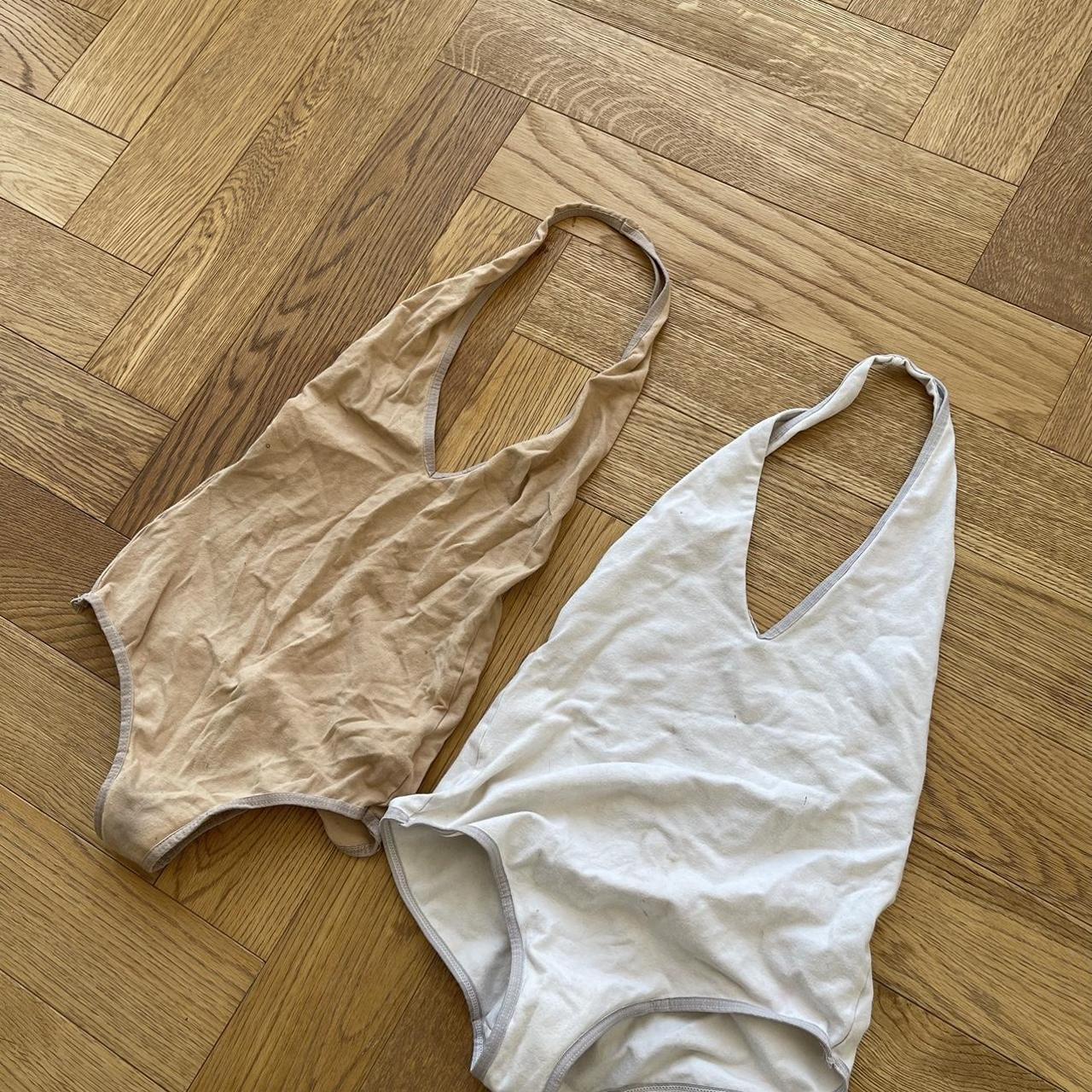 American apparel bodysuit in cream and white Used... Depop