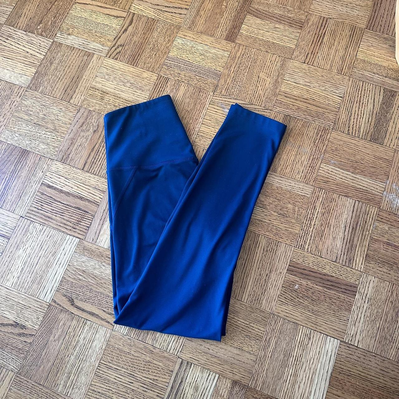 Girlfriend collective leggings in the globe color