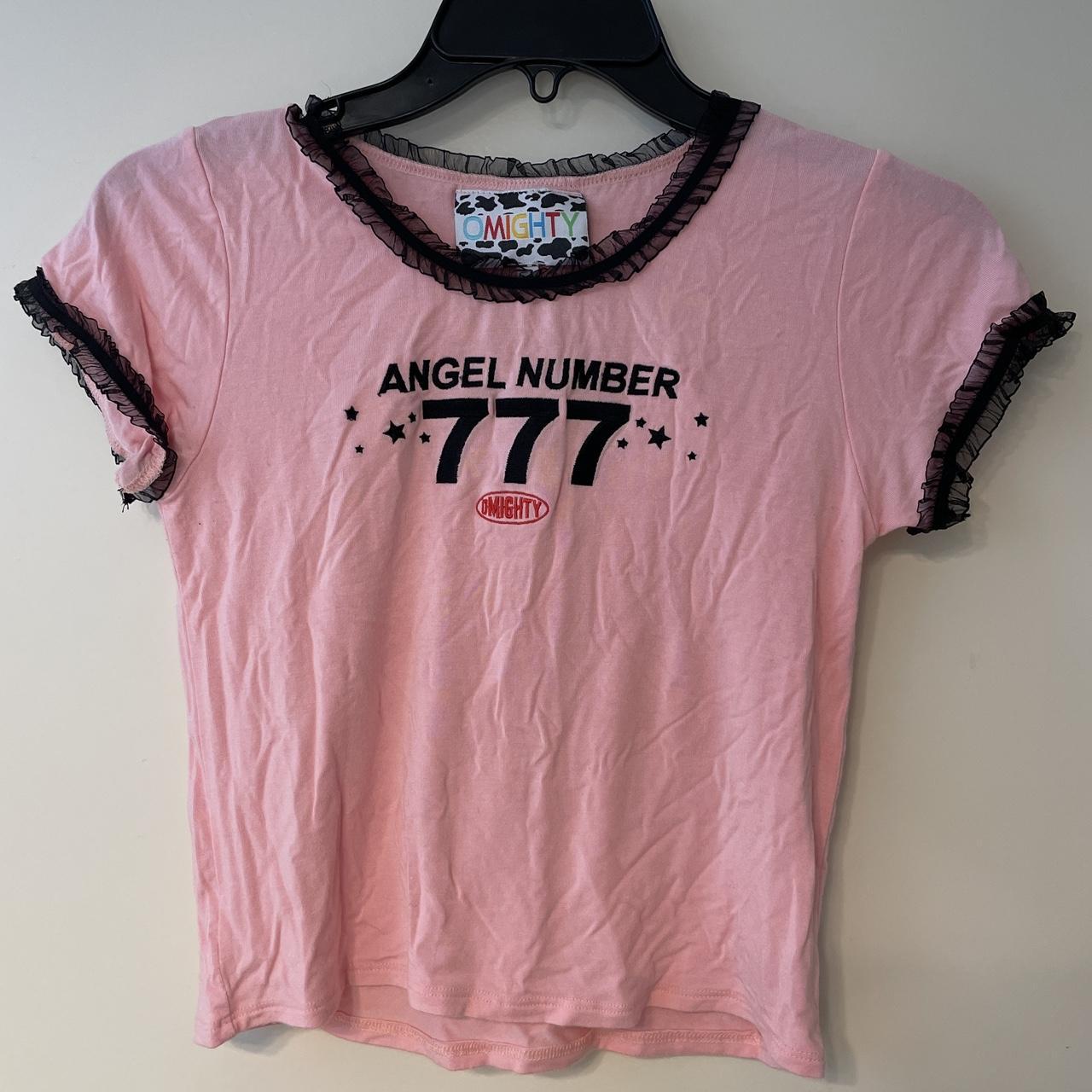 PINK ANGEL NUMBER 777 BABY TEE from omighty w/ black... - Depop