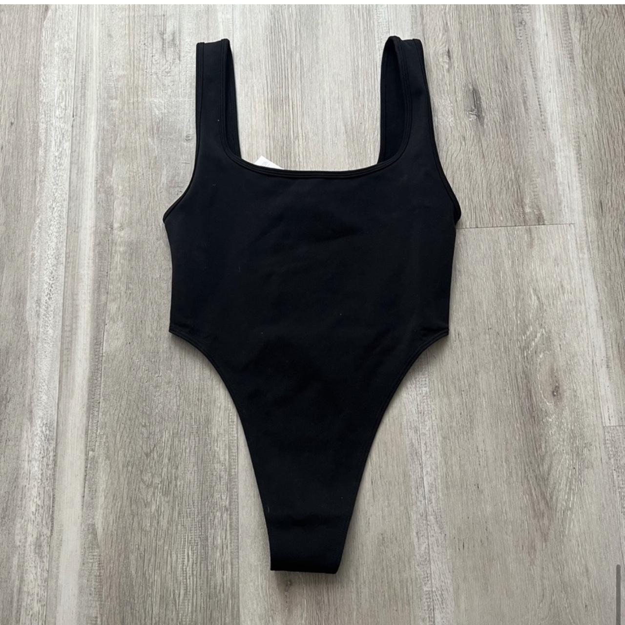 Alo Yoga Women's Black Bodysuit | Depop