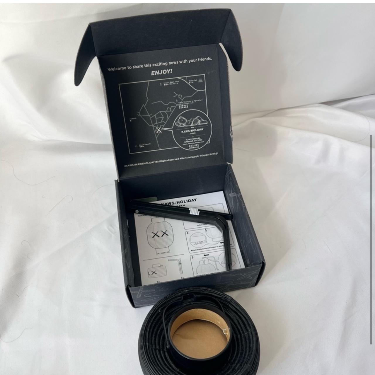 KAWS HOLIDAY JAPAN Lantern Black & White Limited | Depop