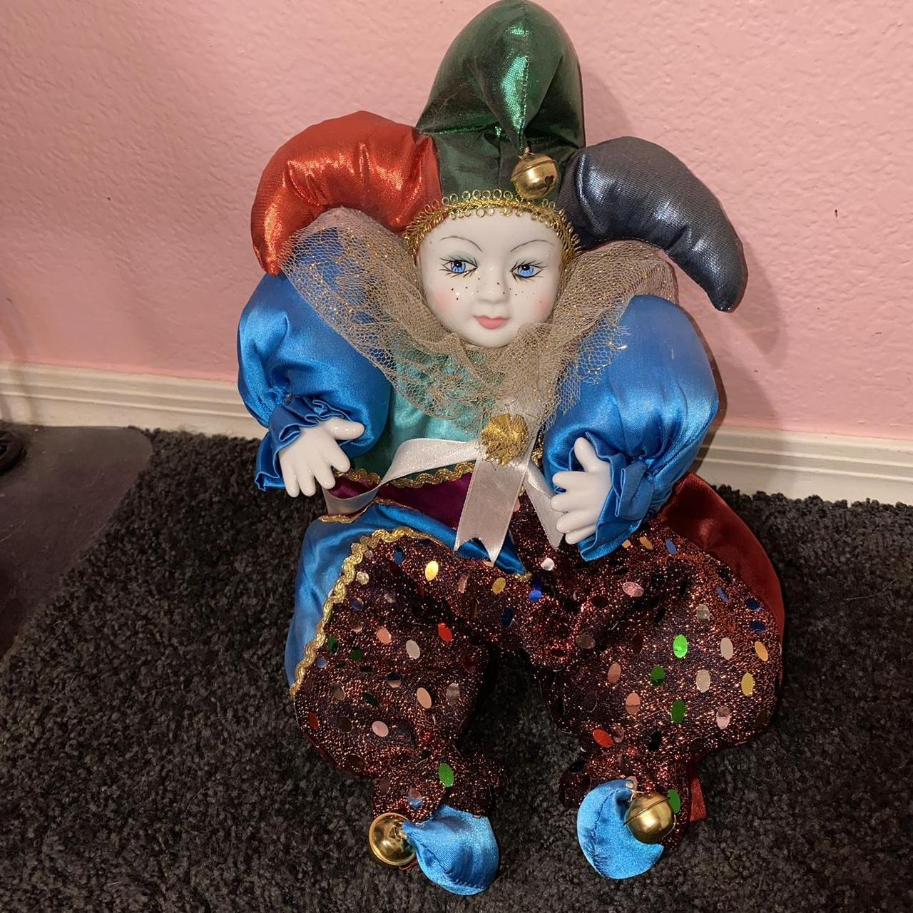 Big old porcelain jester doll w/ opposable limbs... - Depop