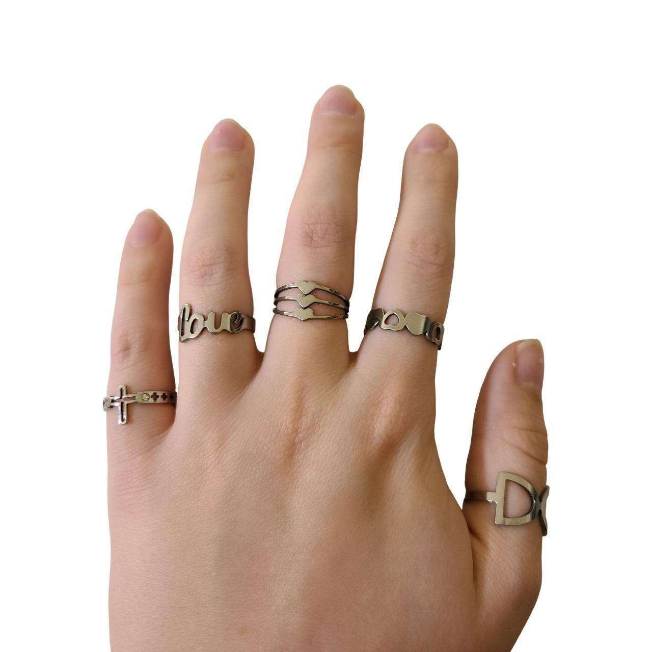 Five stainless steel rings set. Ring size from left... Depop