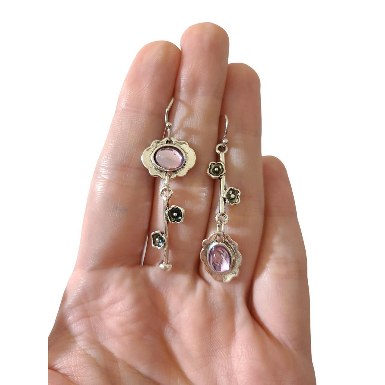 Beautiful light purple earrings. Made of synthetic... Depop