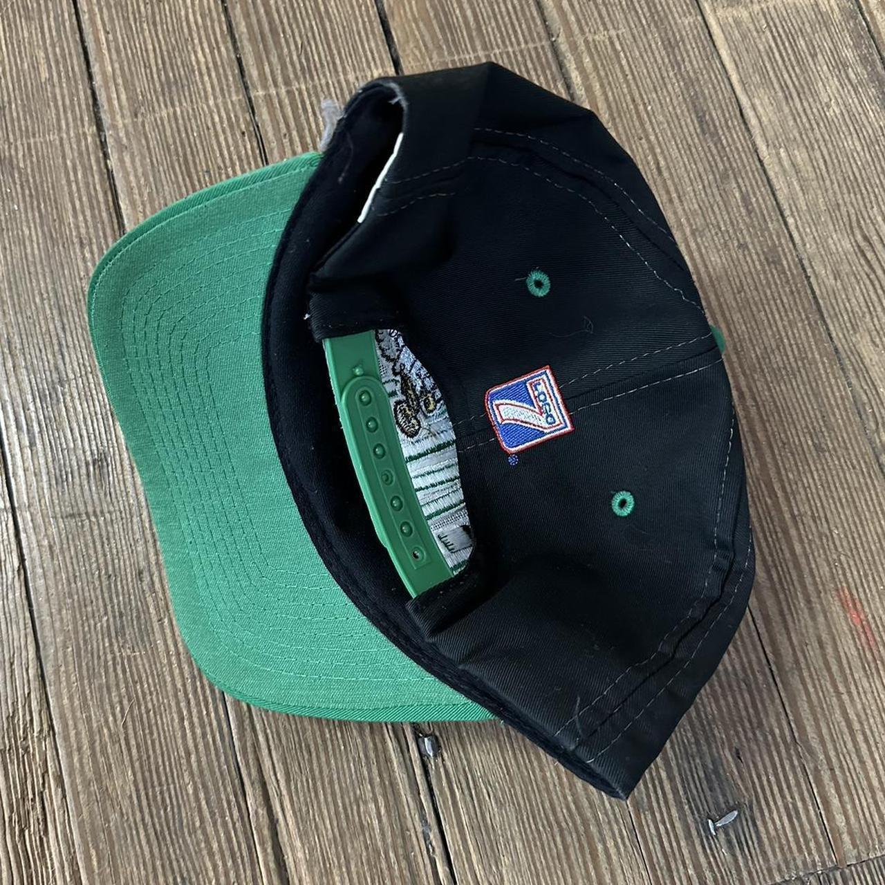 NFL Men's Black and Green Hat | Depop