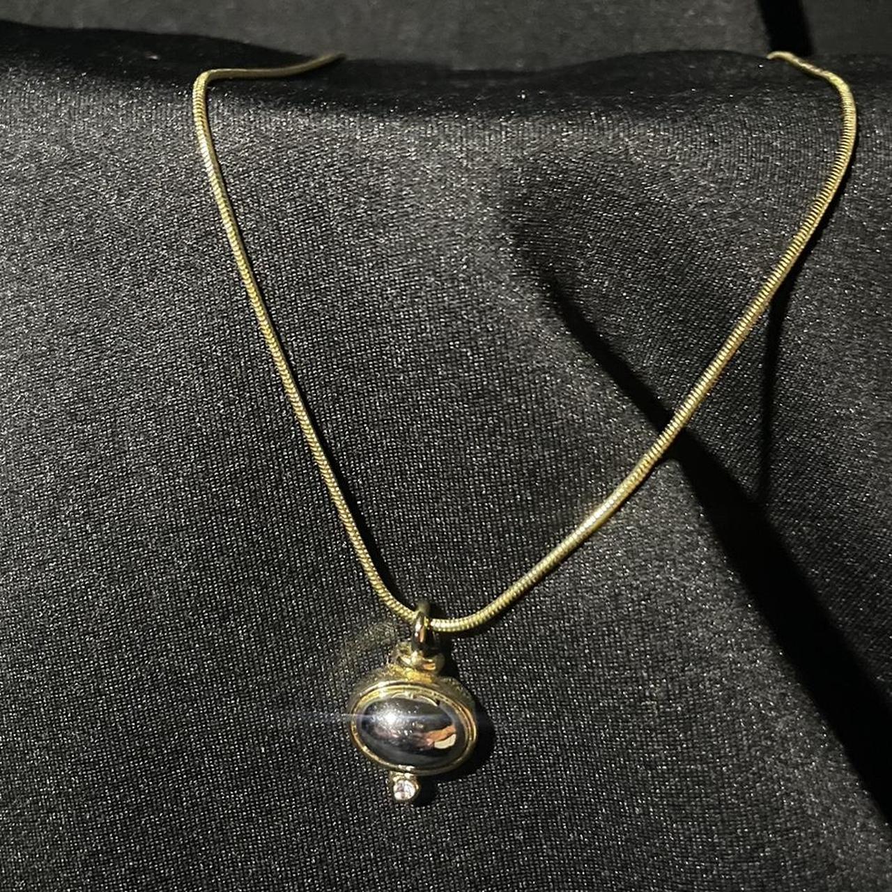 Gold necklace with silver pendant. Never been worn.... - Depop