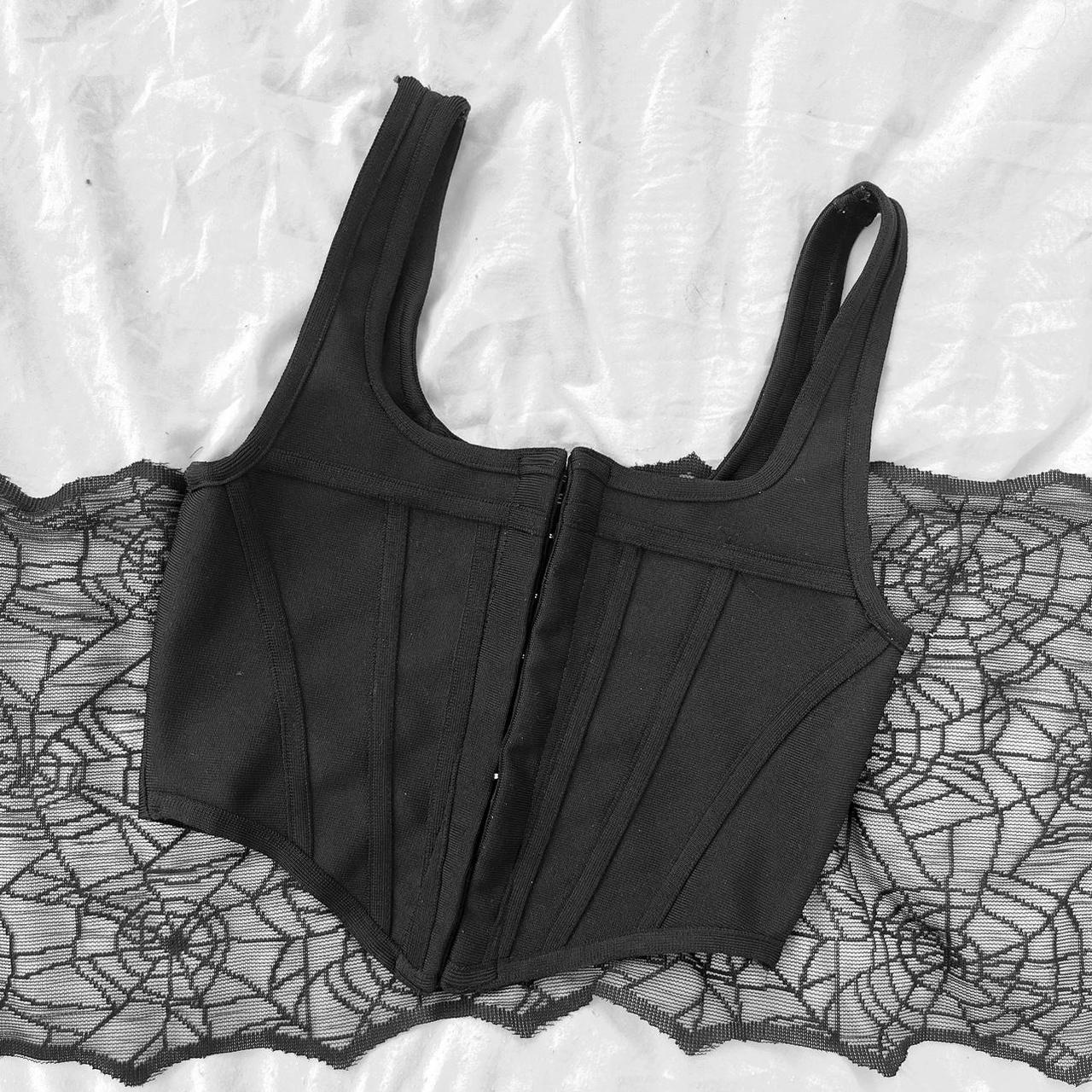 black corset top a cute top with clasps and hooks... Depop