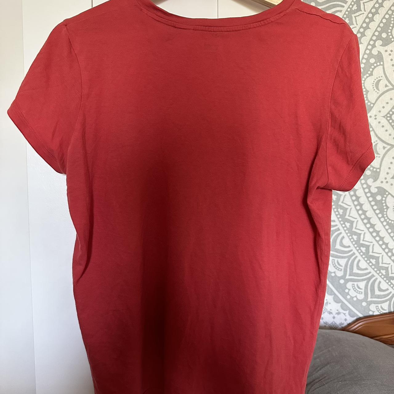 Red Levi’s top. In perfect condition. Would fit... - Depop