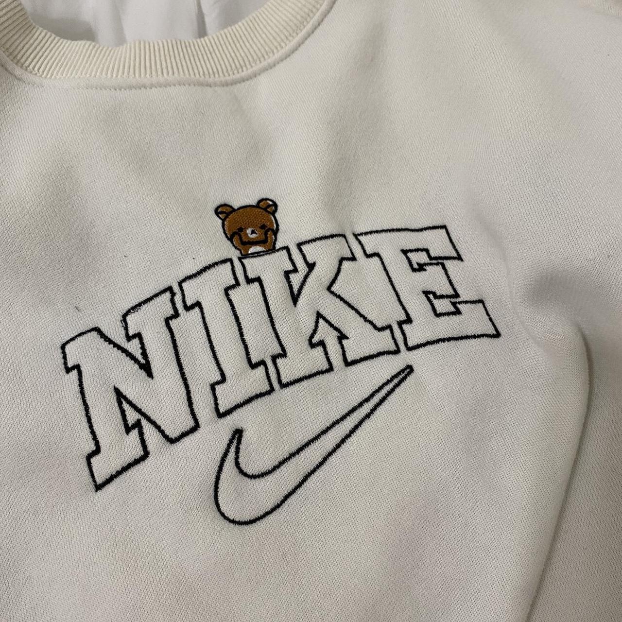 Nike pooh bear discount sweatshirt