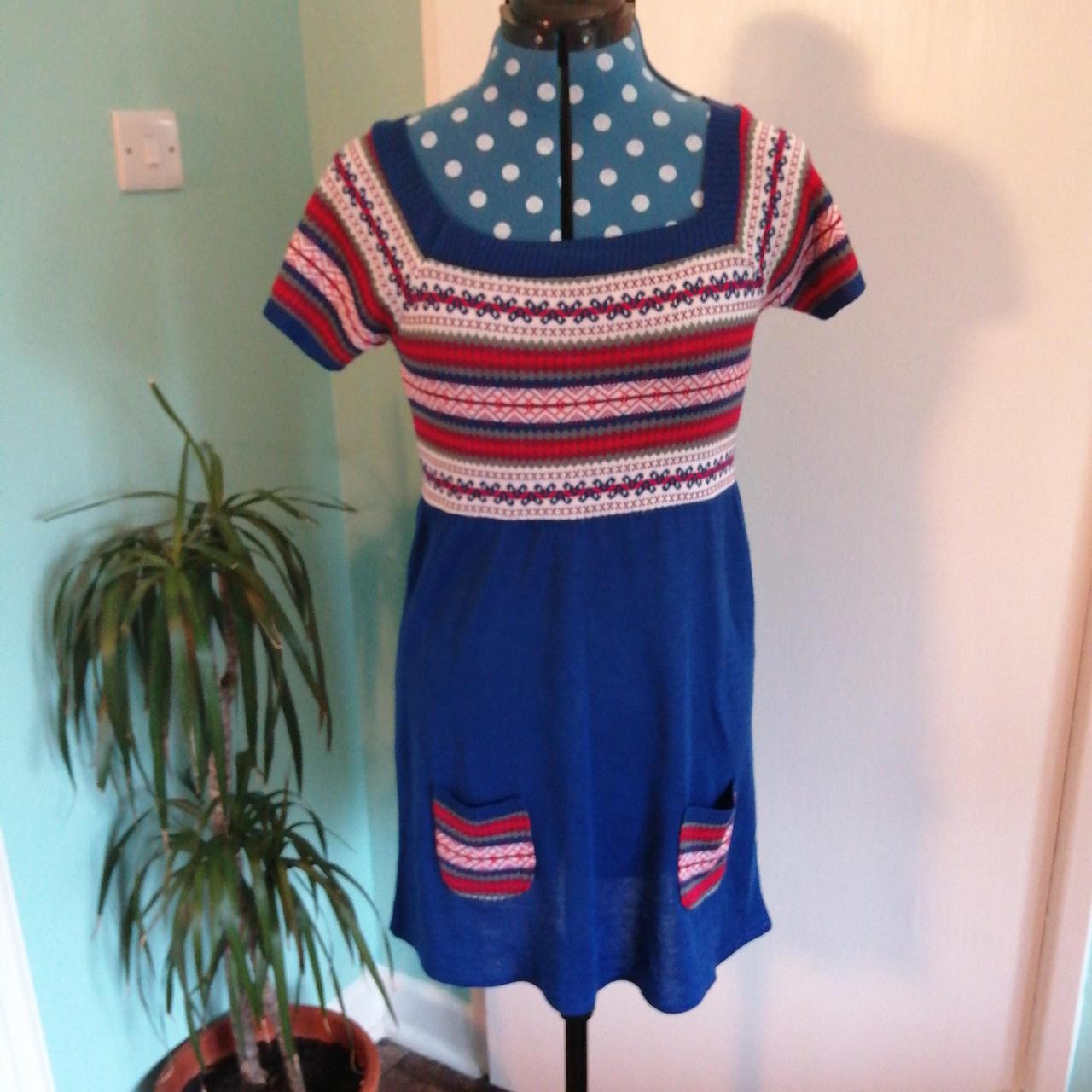 Knitted winter dress with square neckline and short... Depop