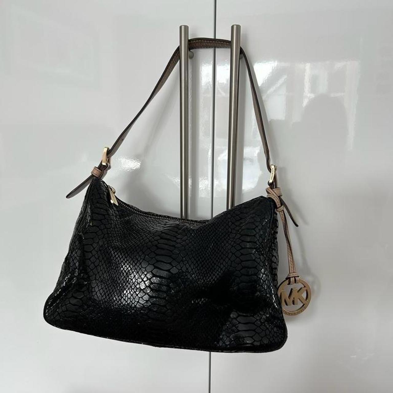 Michael kors black purse with tan straps best sale