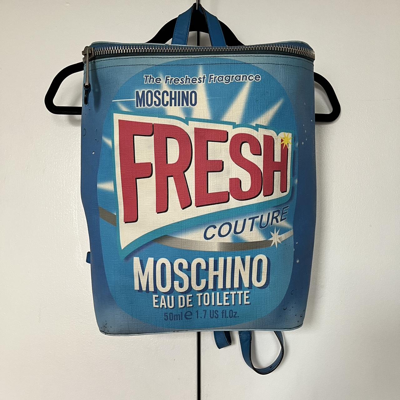 Moschino fresh book bag. It has a broken strap that