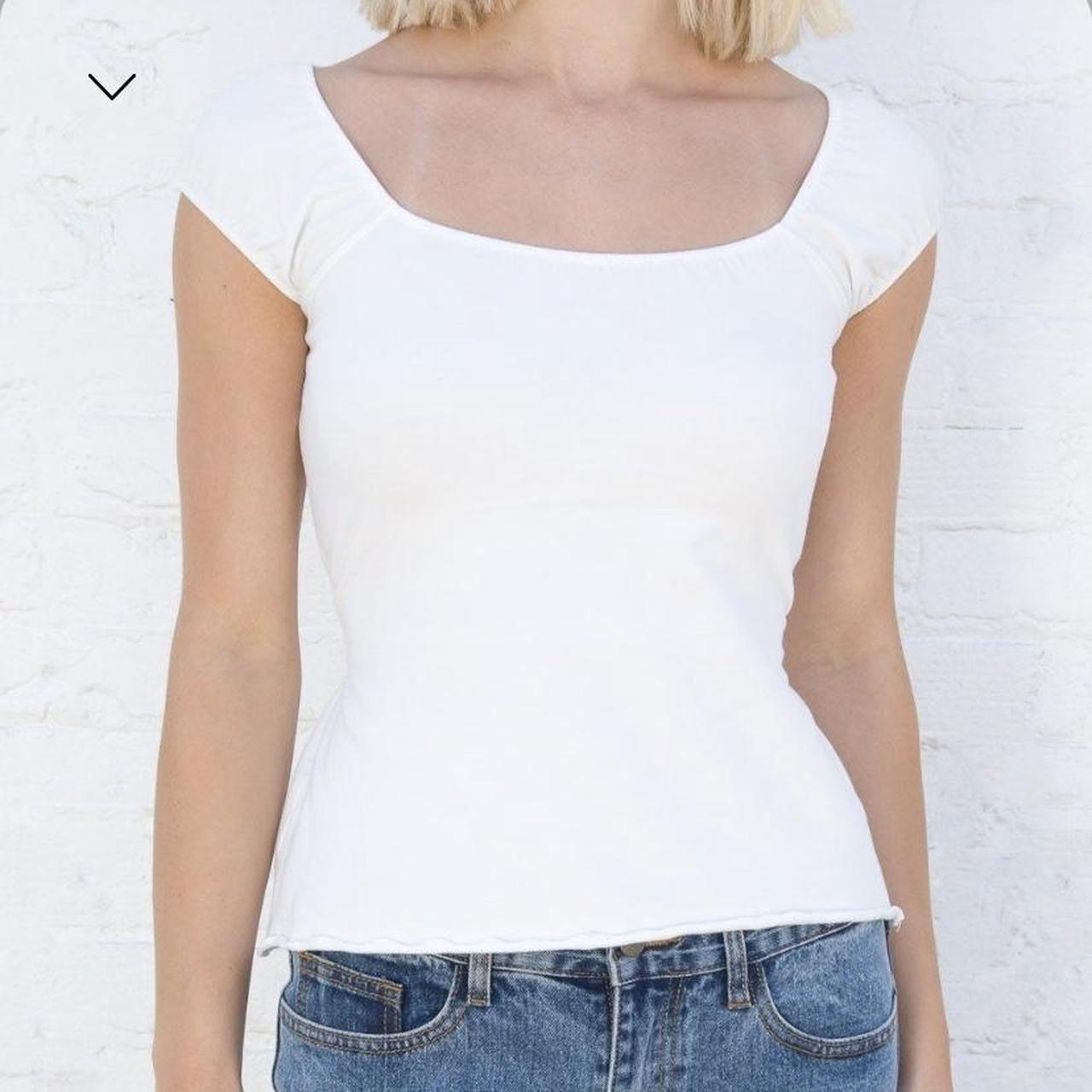 ISO the Brandy Melville Eden button top with a tie... Depop