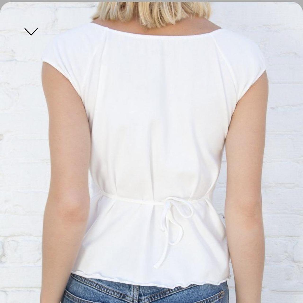 ISO the Brandy Melville Eden button top with a tie... Depop