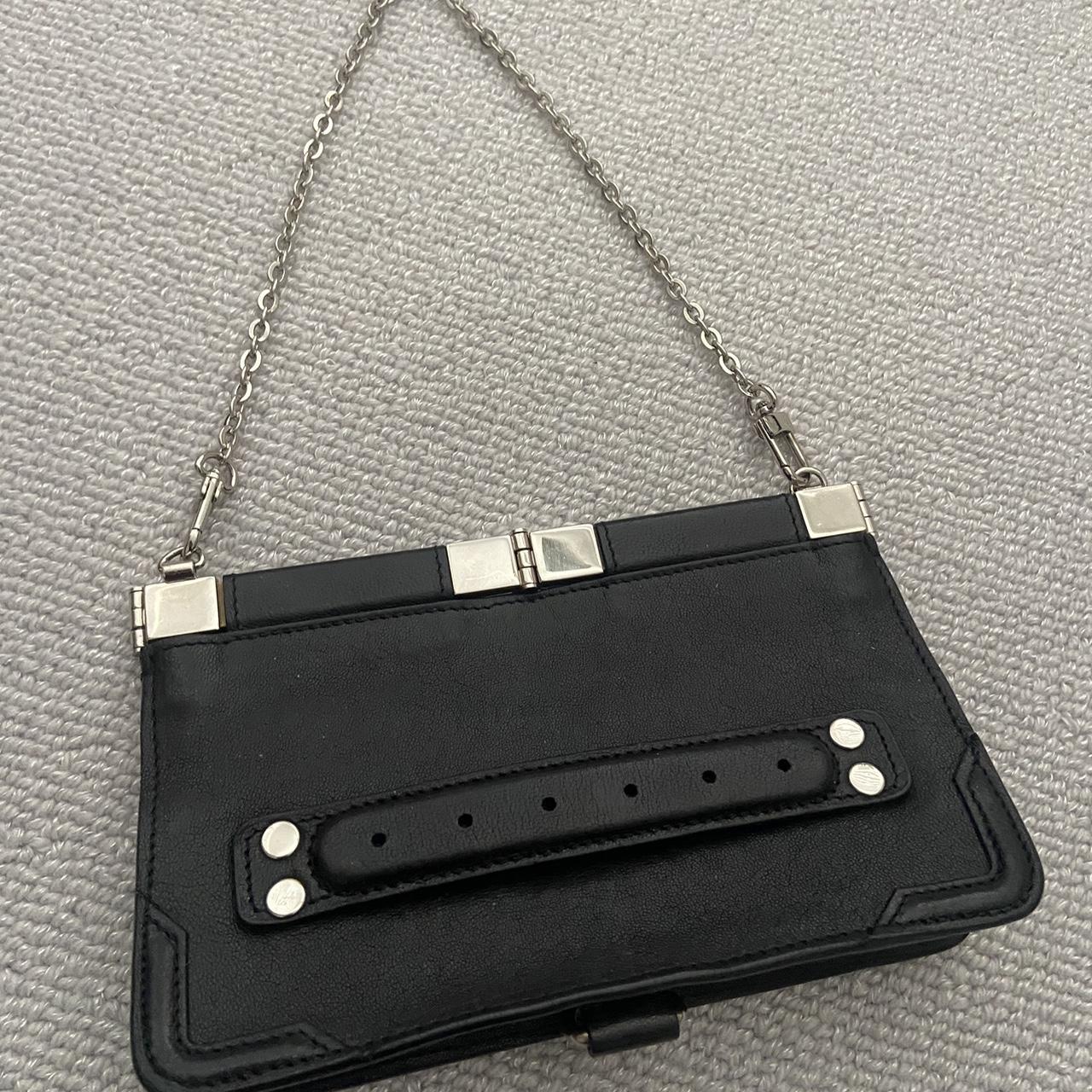 Proenza Schouler black leather shoulder bag. Comes