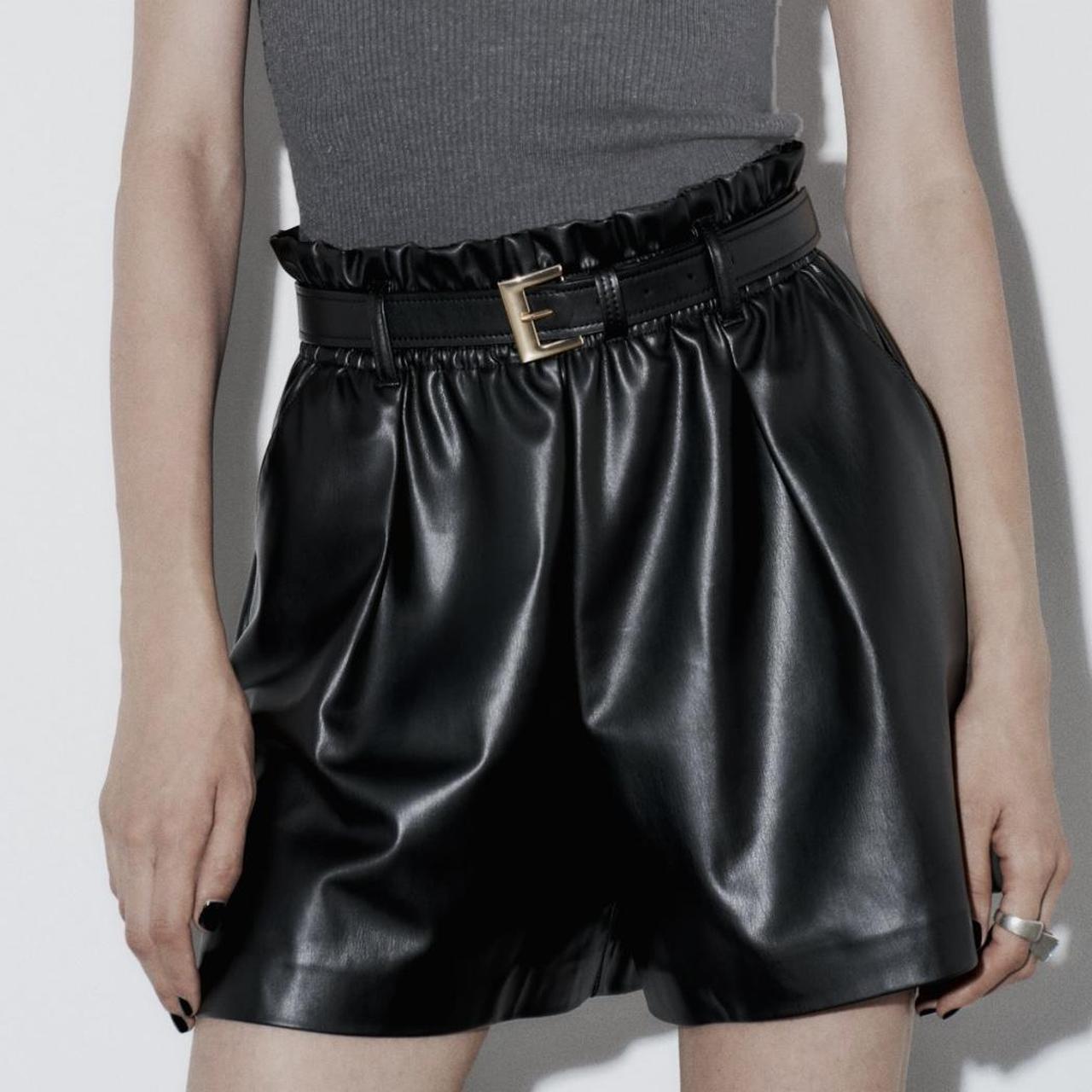 Zara black faux leather shorts with gold belt size. Depop