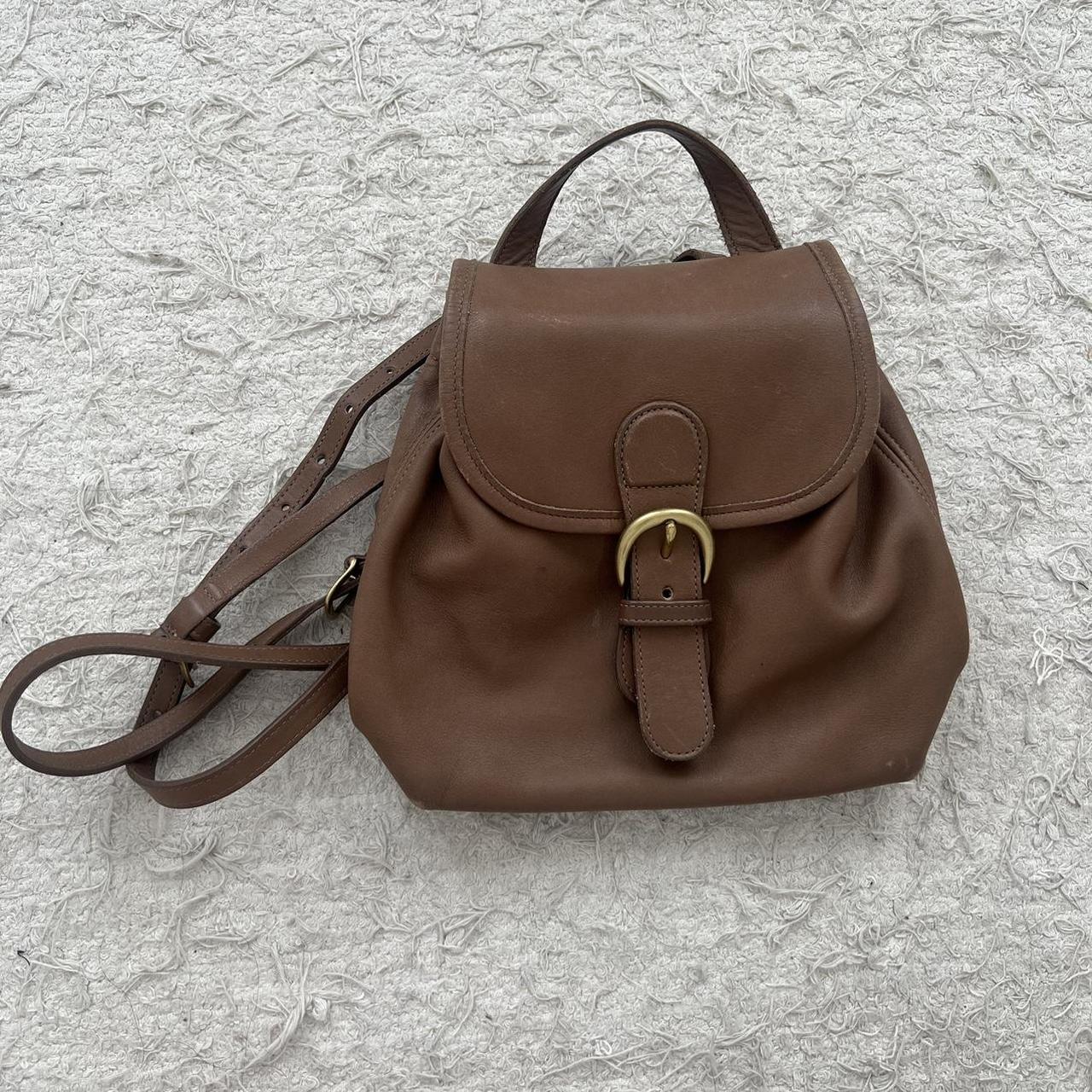 Coach brown leather buckle backpack. In good vintage Depop